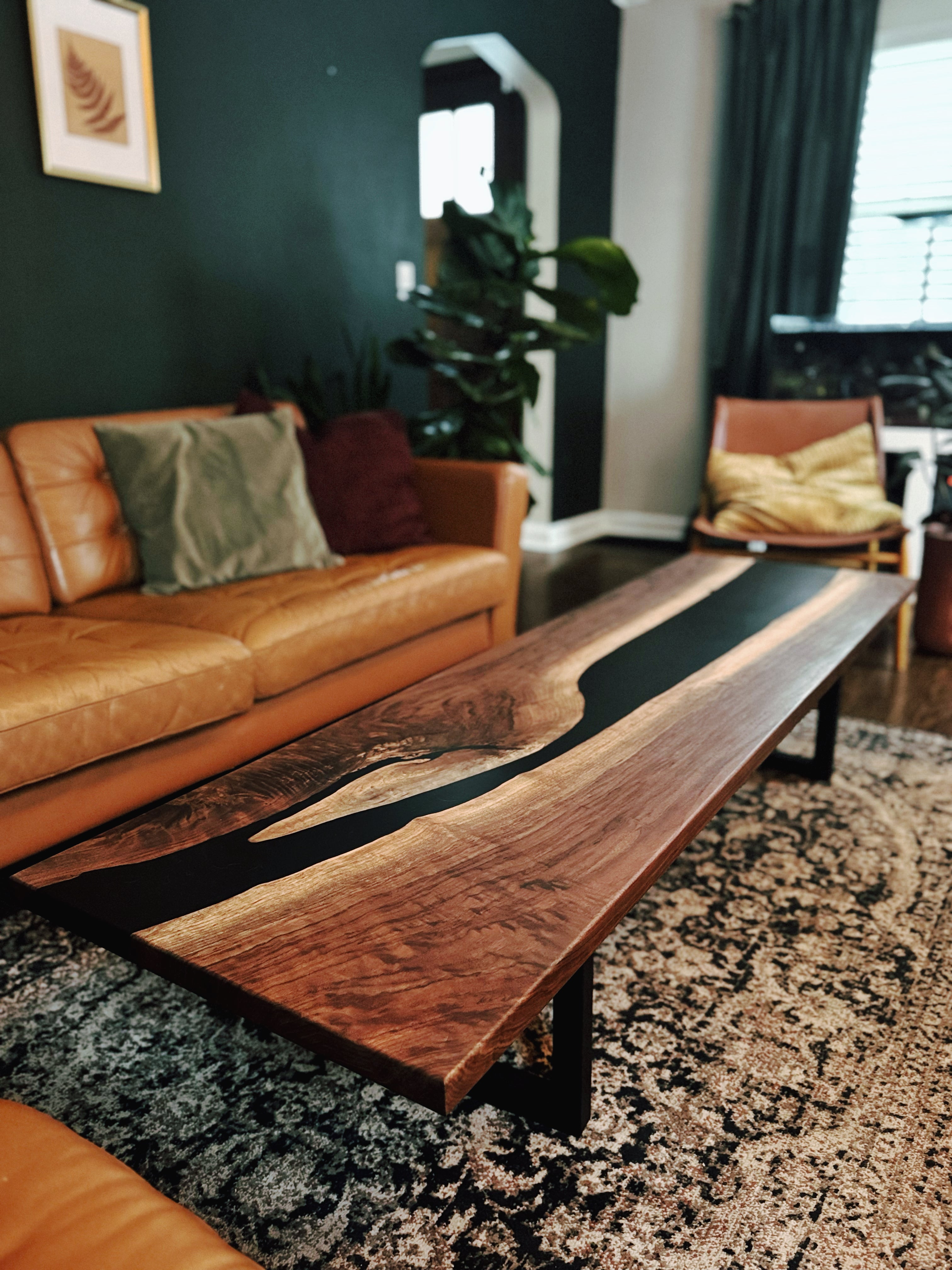 Custom Walnut Epoxy River Coffee Table featured in a Living Room 
