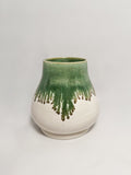 Medium curved vase with mossy green and white glaze