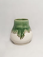 Medium curved vase with mossy green and white glaze