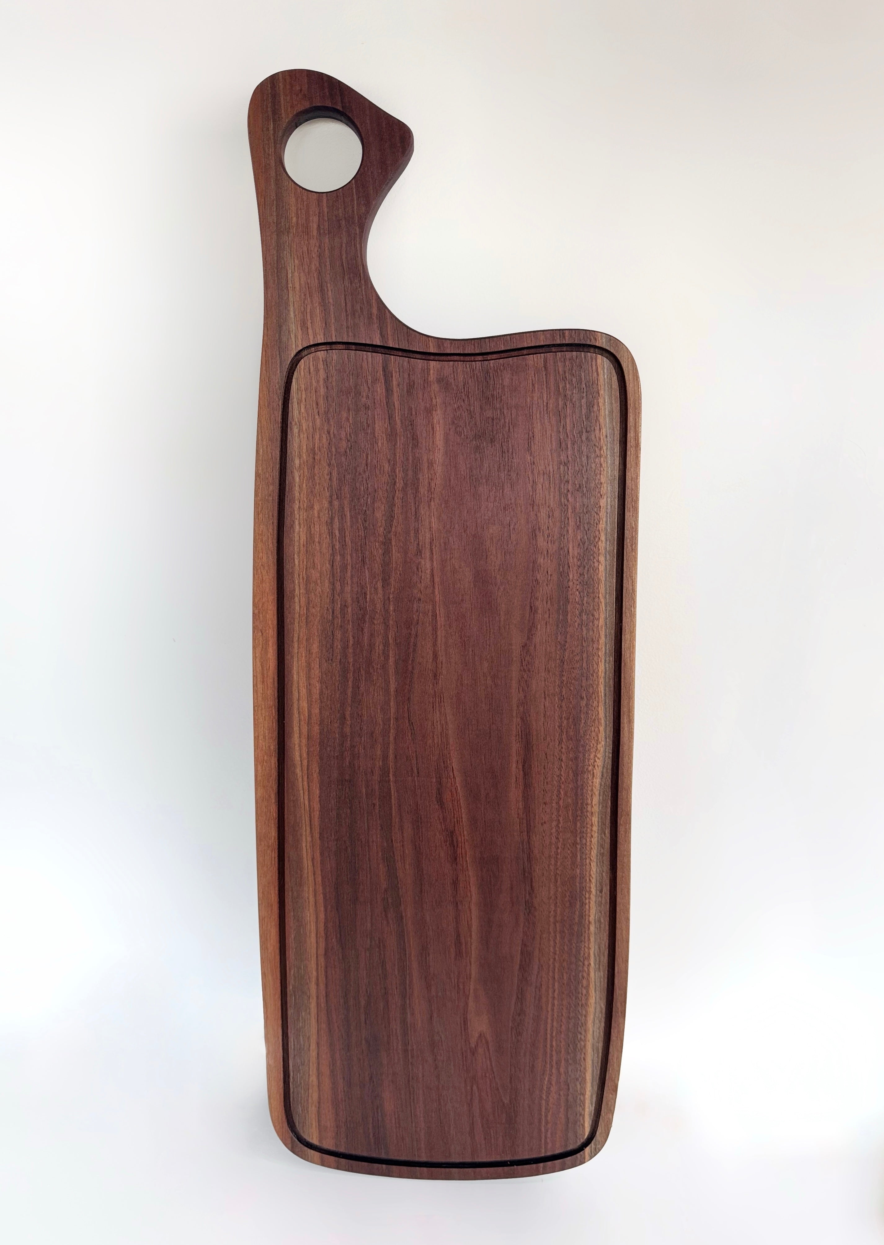 The Mallard extra-long walnut cutting board, perfect for charcuterie, meal prep, and serving.