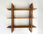he Odyssey floating oak shelf with a modern bracket, inspired by Scandinavian minimalist design.