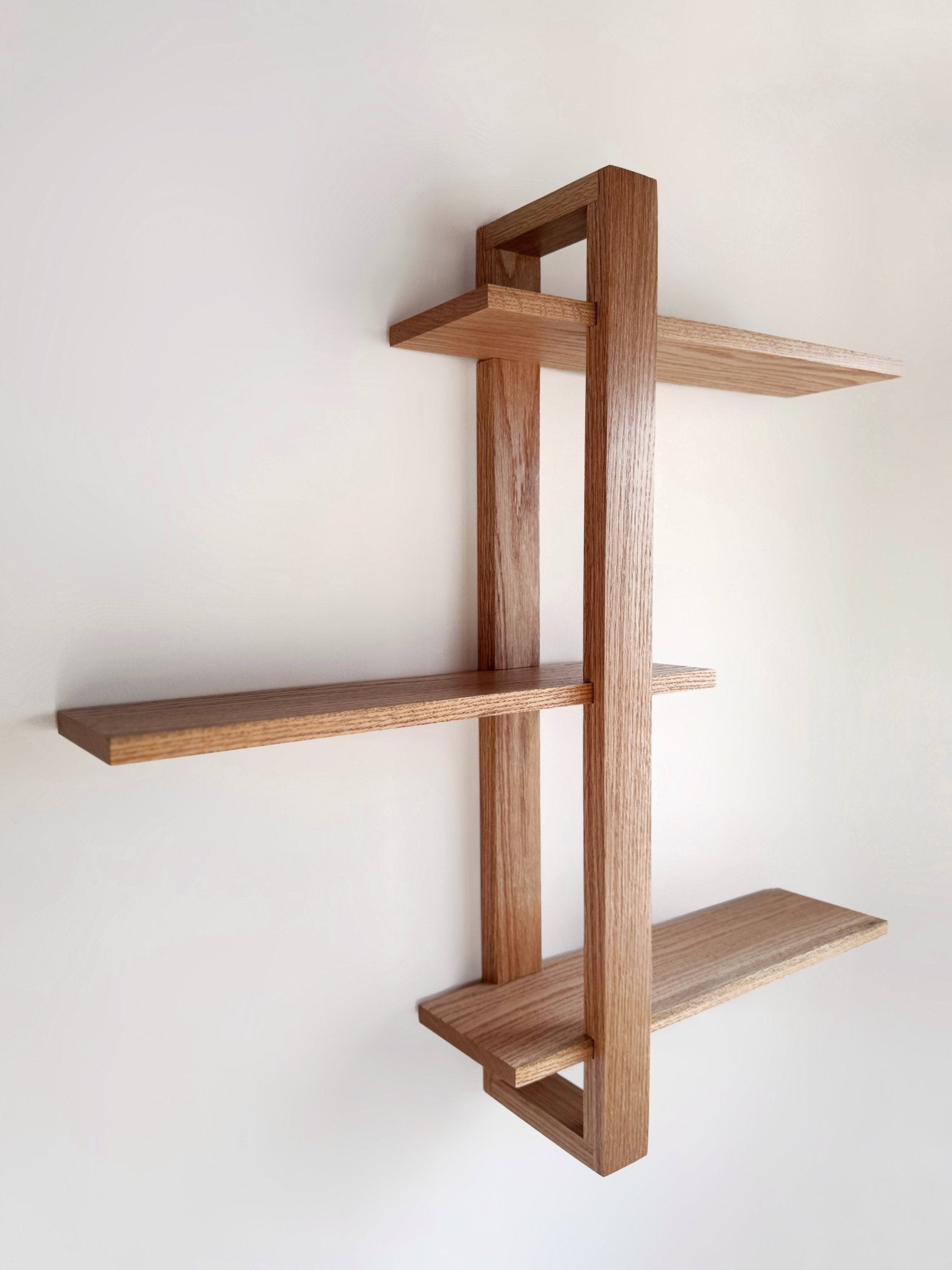 Handmade Scandinavian wood shelf – The Odyssey, featuring a simple floating design in natural oak.