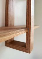 Modern wall-mounted floating shelf – The Odyssey, crafted from real oak for durability and style.